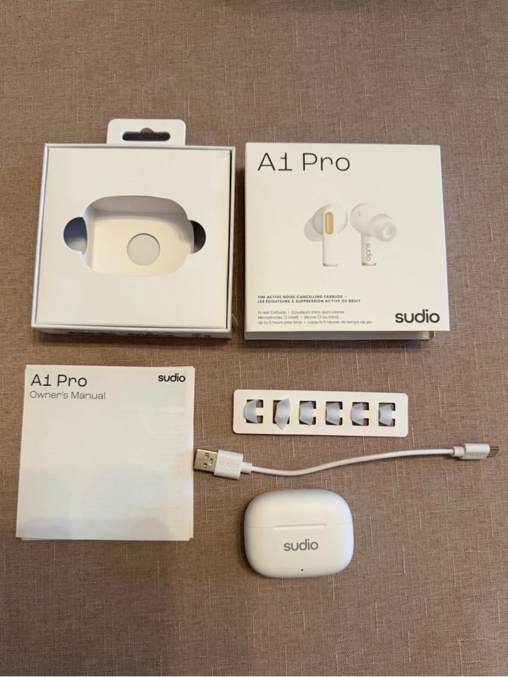Like new Studio A1 Pro True Wireless Earbuds in White with Charging Case